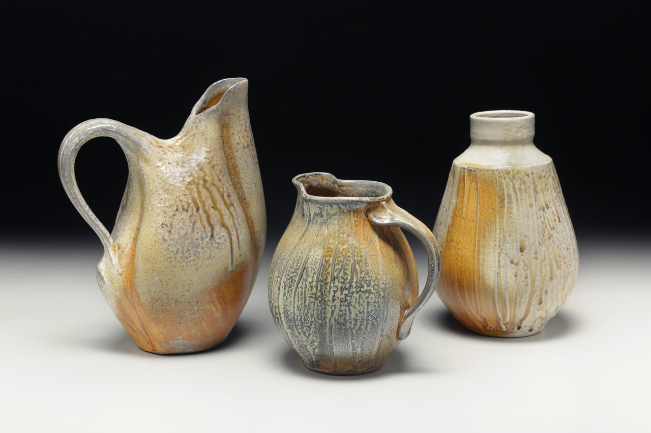 Sarah Wells Rolland finished pots, kazie soda wood fired, grouping, turmeric flashing slip
