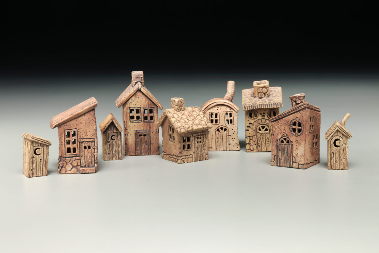 Karen Dubois finished pots, hand built small houses grouping