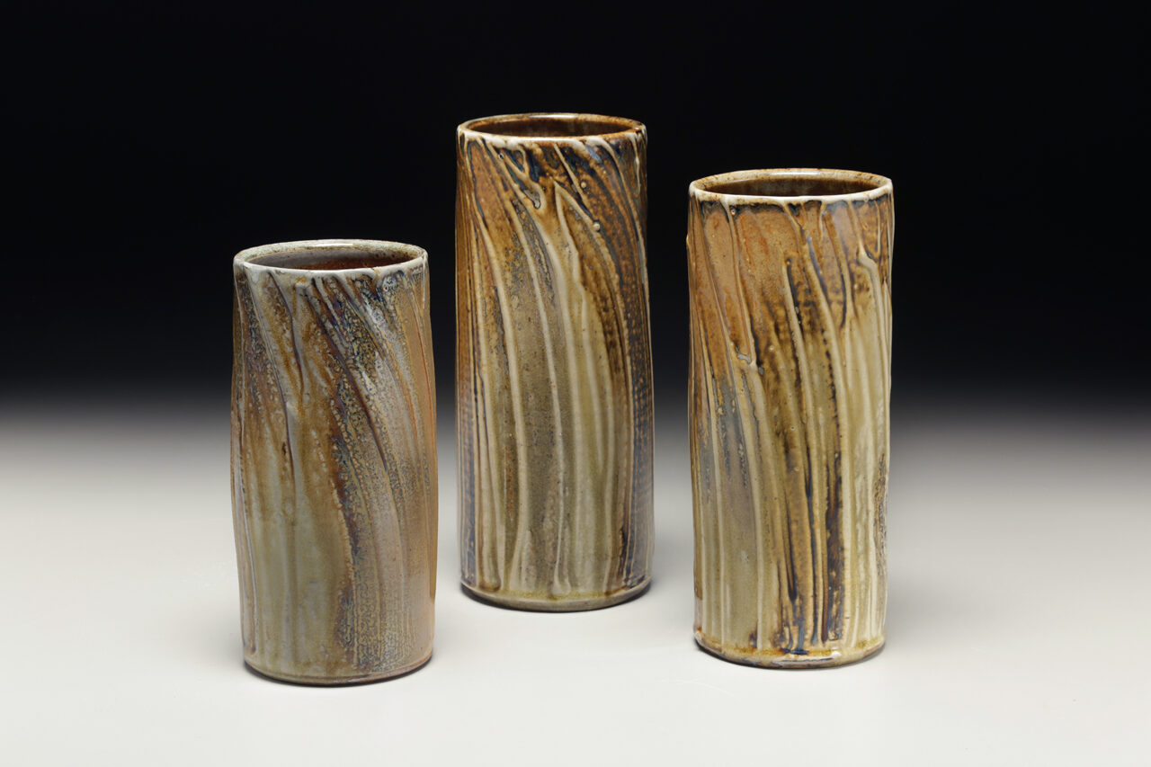 Sarah Wells Rolland finished pots grouping trio, cylinder vases, wood soda kazie fired, seagrass slip