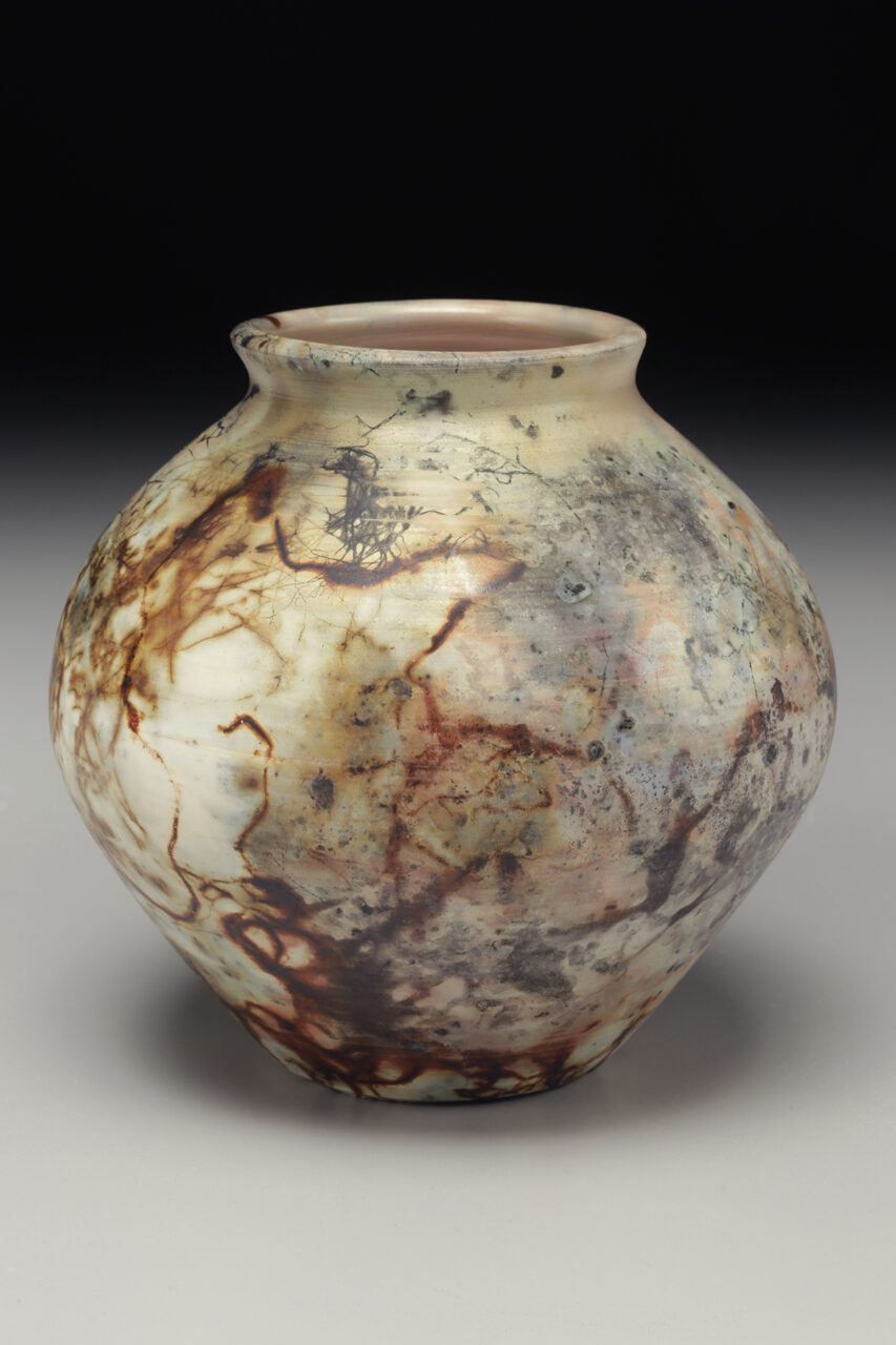 Judi Harwood finished pot, sagger fired, round vessel