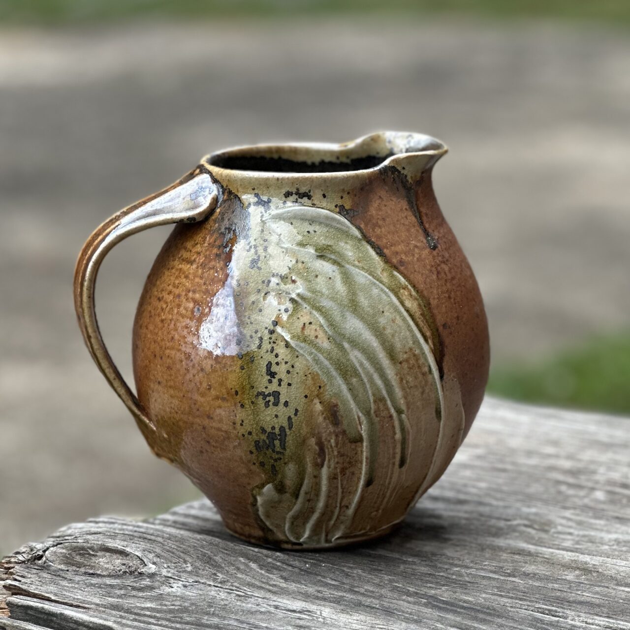 Sarah Wells Rolland finished pot, melon pitcher, wood soda kazie fired, seagrass slip
