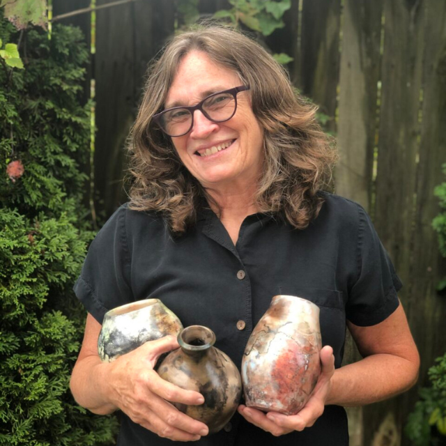 Judi Harwood square headshot with finished pots