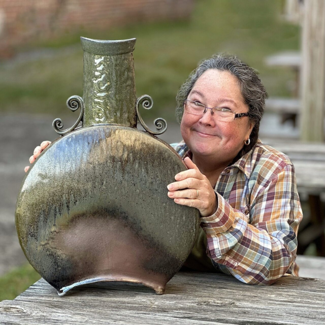 Karen Dubois square headshot with finished pot