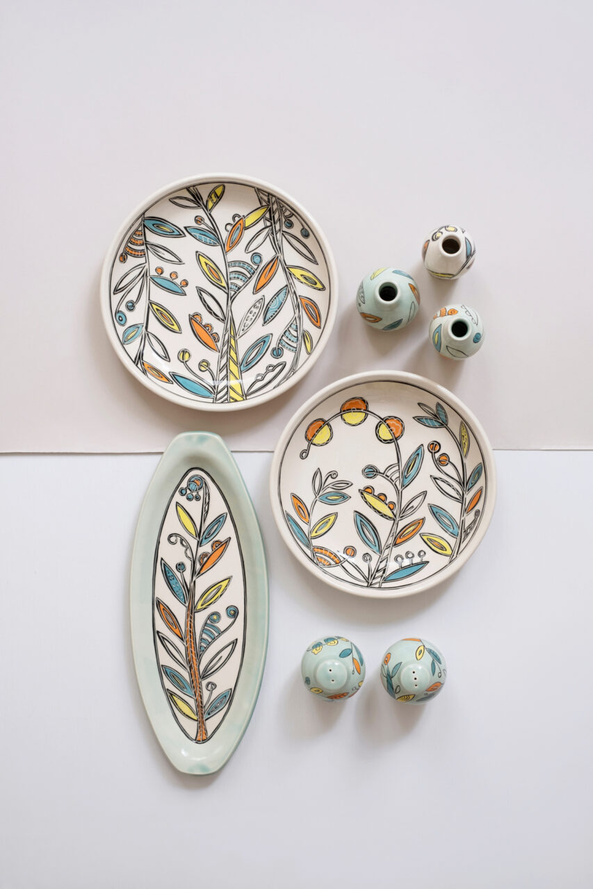 Maria Andrade Troya finished pot grouping, colorful vines, vertical, Photo by Nicole McConville (www.nicolemcconville.com)