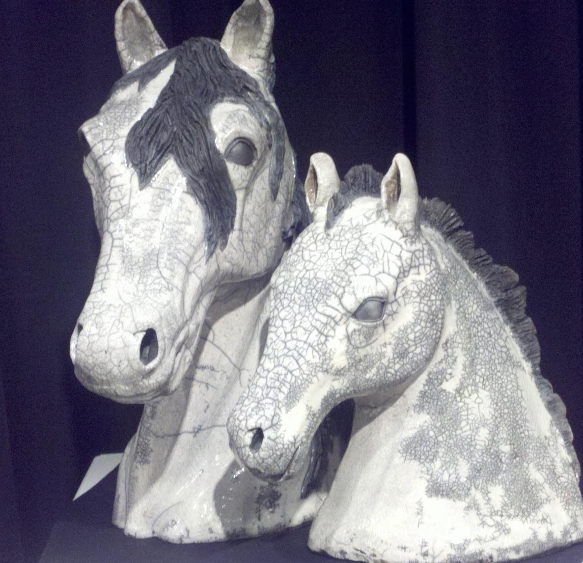 Judi Harwood white crackle glazed raku two horse head sculptures