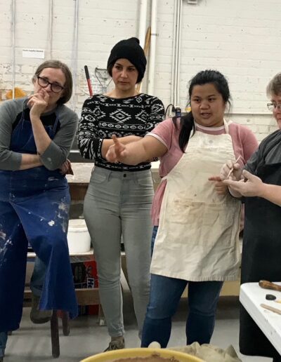 ISM students group critique of leather hard pot